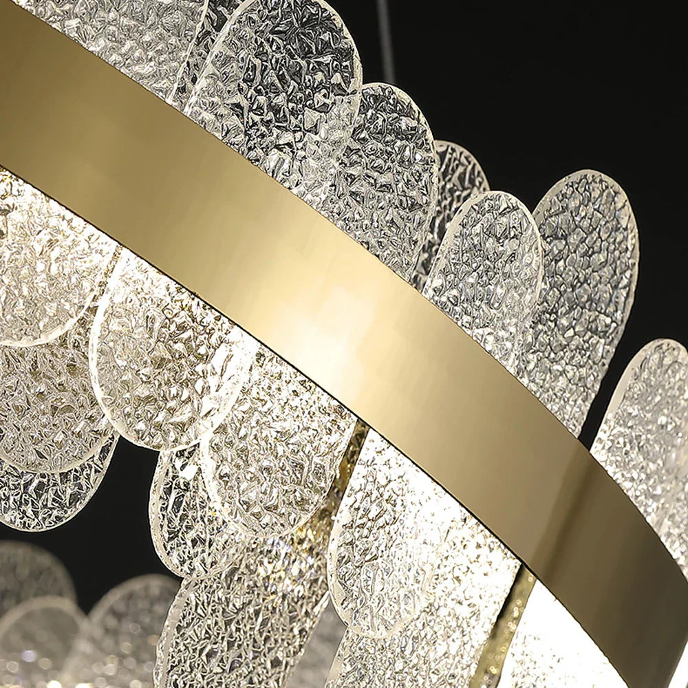 ثريا LED ذهبية بتصميم عصري من الفولاذ المقاوم للصدأ من DecorBites™ لغرفة الطعام