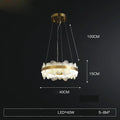 ثريا LED ذهبية بتصميم عصري من الفولاذ المقاوم للصدأ من DecorBites™ لغرفة الطعام