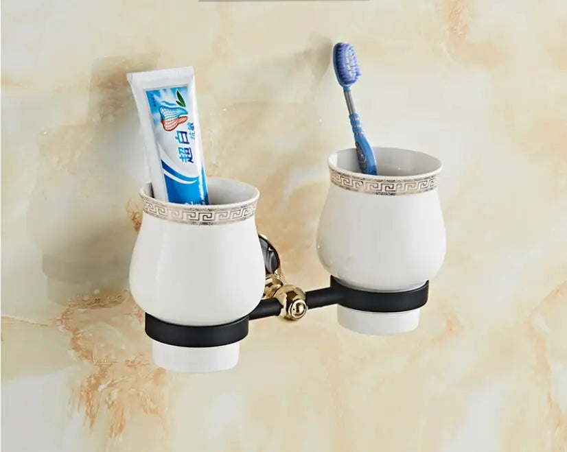طقم إكسسوارات حمام DecorBites™ ذهبي وأسود، علاقة مناشف، حامل فرشاة تواليت، حامل ورق