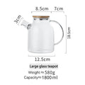 DecorBites™ 1.8L Transparent Borosilicate Glass Teapot | Heat-Resistant Flower Tea Set