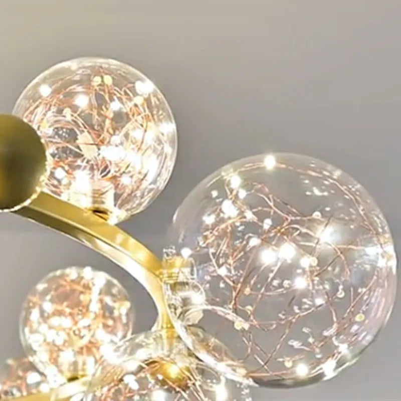 ثريا بابلز زجاجية ذهبية بإضاءة LED من DecorBites™ لغرفة الطعام والمطعم