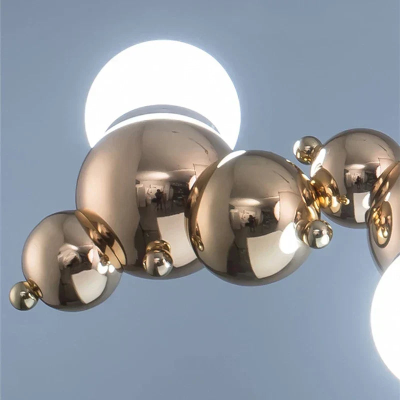 ثريا كاتربيلر LED من DecorBites™: مصباح معلق طويل أنيق لغرفة المعيشة، المطعم، الفندق