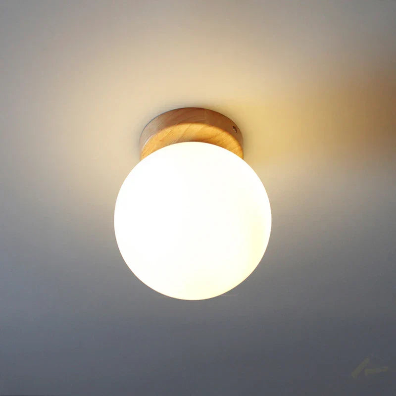 DecorBites™ Glass Ball LED Ceiling Lamp on Wooden Pedestal