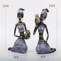 DecorBites™ African Woman Sculpture: Realistic Home Decor Figurine