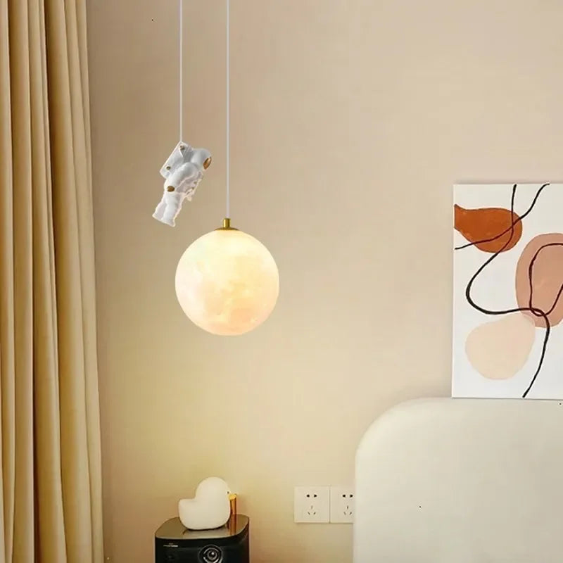 DecorBites™ Astronaut Moon LED Pendant Light for Children's Room, Nordic Iron Design.