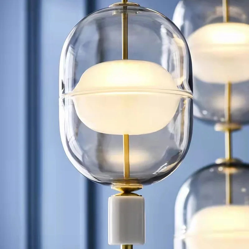 DecorBites™ مصباح معلق زجاجي شفاف رمادي وعنبري بلمسة نهائية معدنية من الرخام الذهبي