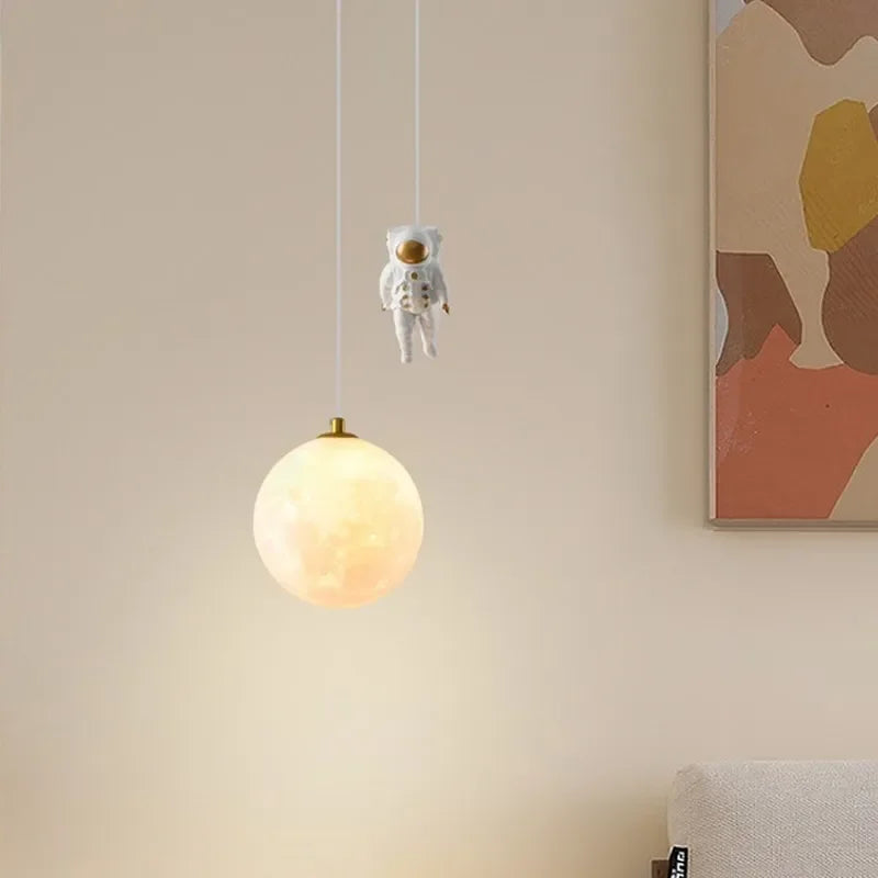 DecorBites™ Astronaut Moon LED Pendant Light for Children's Room, Nordic Iron Design.