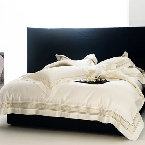 طقم ملاءات DecorBites™ من القطن المصري 1400 غرزة مع تطريز عريض الحواف وتصميم مفرغ