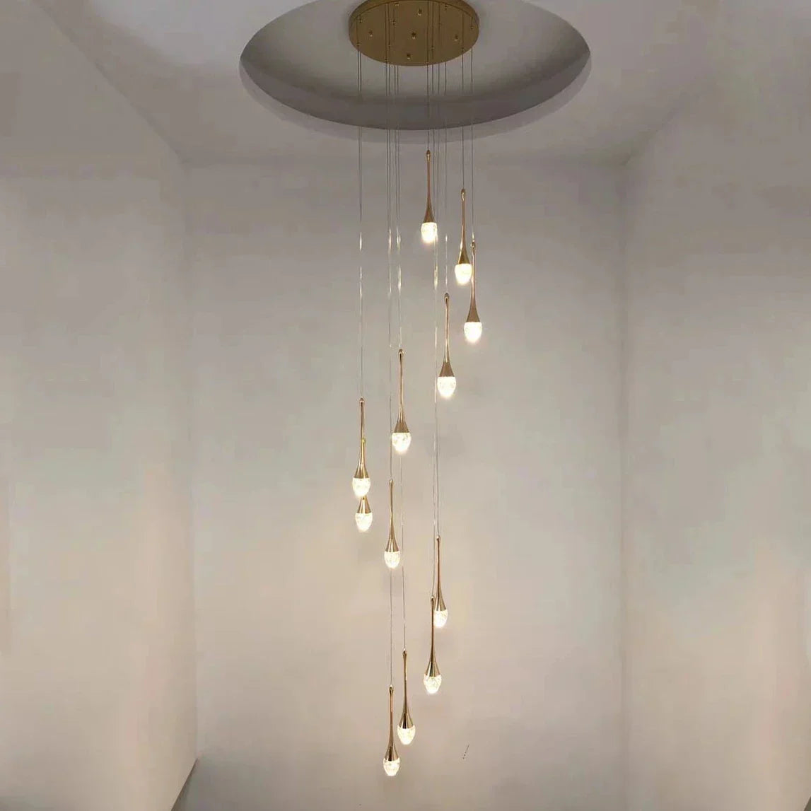 DecorBites™ Crystal LED Staircase Chandelier - Gold Pendant Lamp for Living Room & Lobby