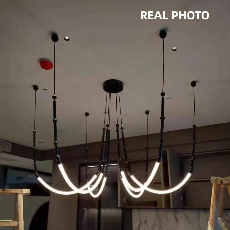 مصابيح DecorBites™ المعلقة من الخيزران: فوانيس LED لدرج علوي على الطراز الاسكندنافي لديكور بسيط