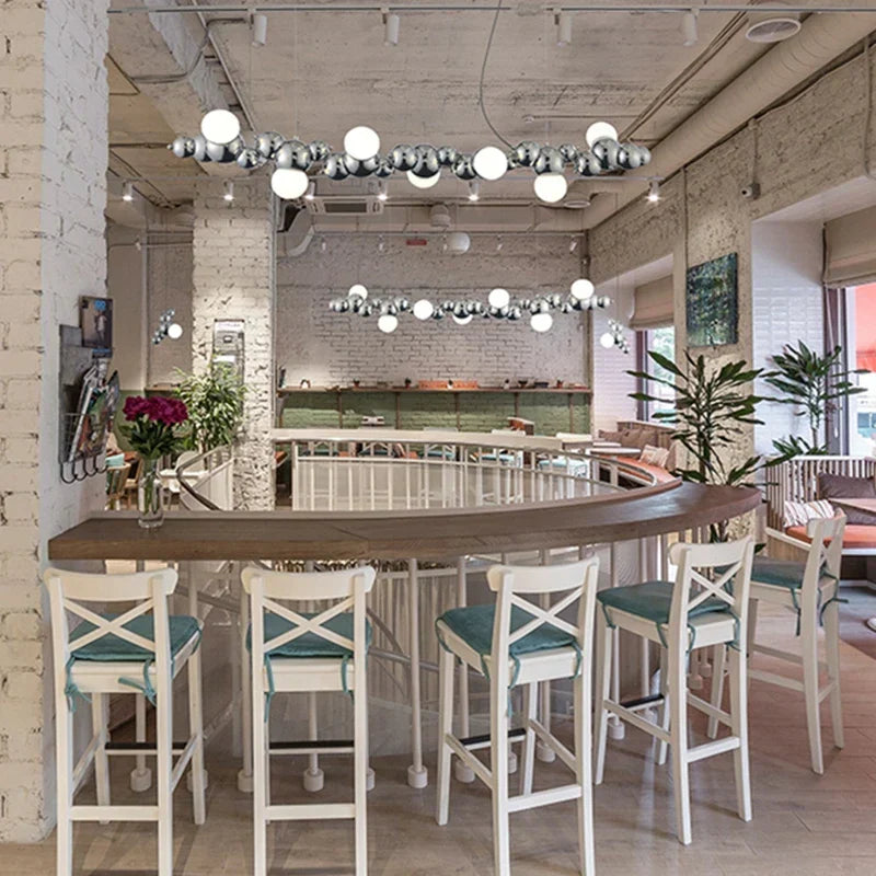 ثريا كاتربيلر LED من DecorBites™: مصباح معلق طويل أنيق لغرفة المعيشة، المطعم، الفندق