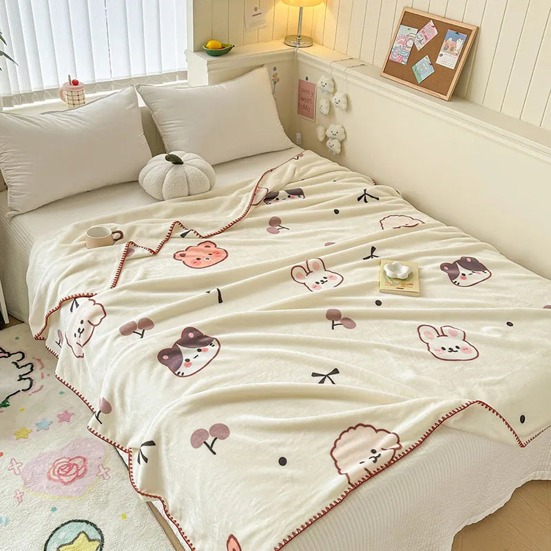 DecorBites™ Cozy Milk Velvet Blanket: Cute Pattern, Warm, Multi-Functional Sofa & Travel Shawl