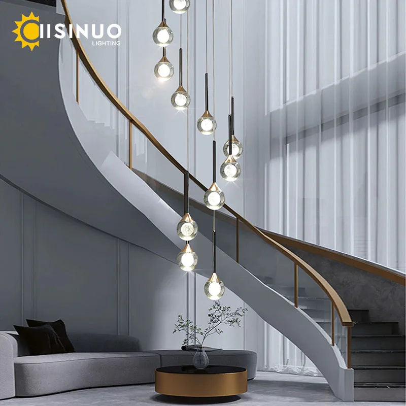 ثريا كريستال ذهبية بتصميم قطرة المطر من DecorBites™ لبهو الدرج