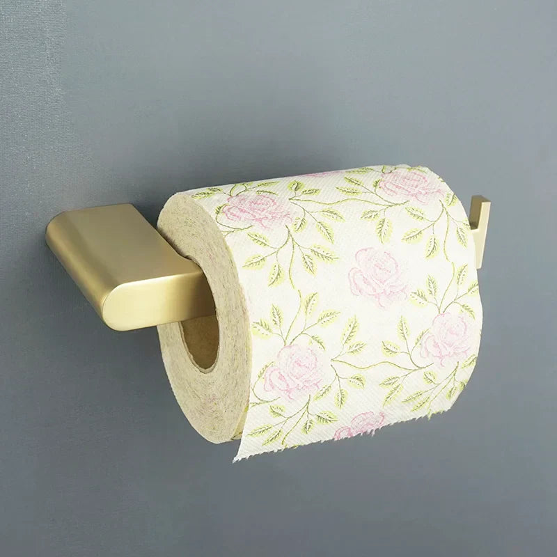 مجموعة إكسسوارات حمام ذهبية من DecorBites™: قضيب تعليق المناشف، حامل ورق المرحاض، رف مناشف، خطاف