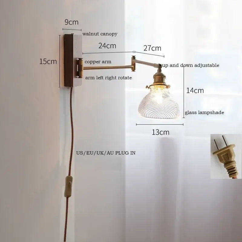 Adjustable brass wall sconce with ribbed glass shade bedroom light