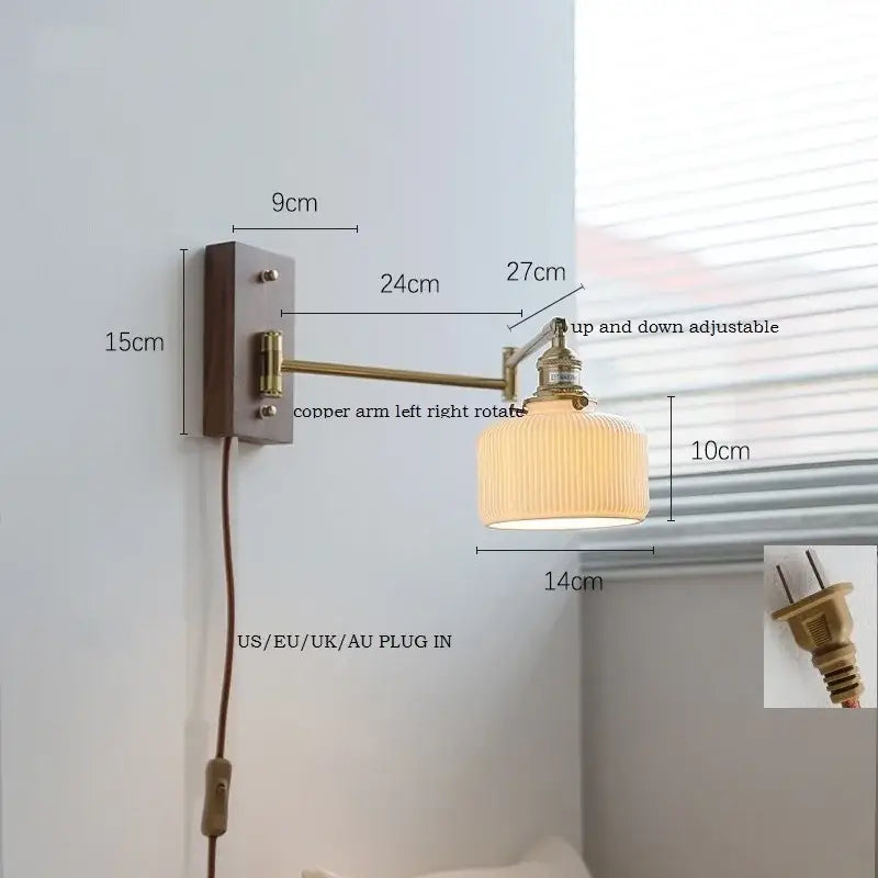 Adjustable brass wall sconce with ribbed glass shade bedroom light