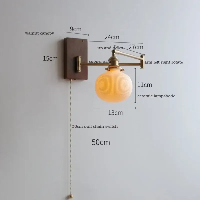 Adjustable brass wall sconce with ribbed glass shade bedroom light