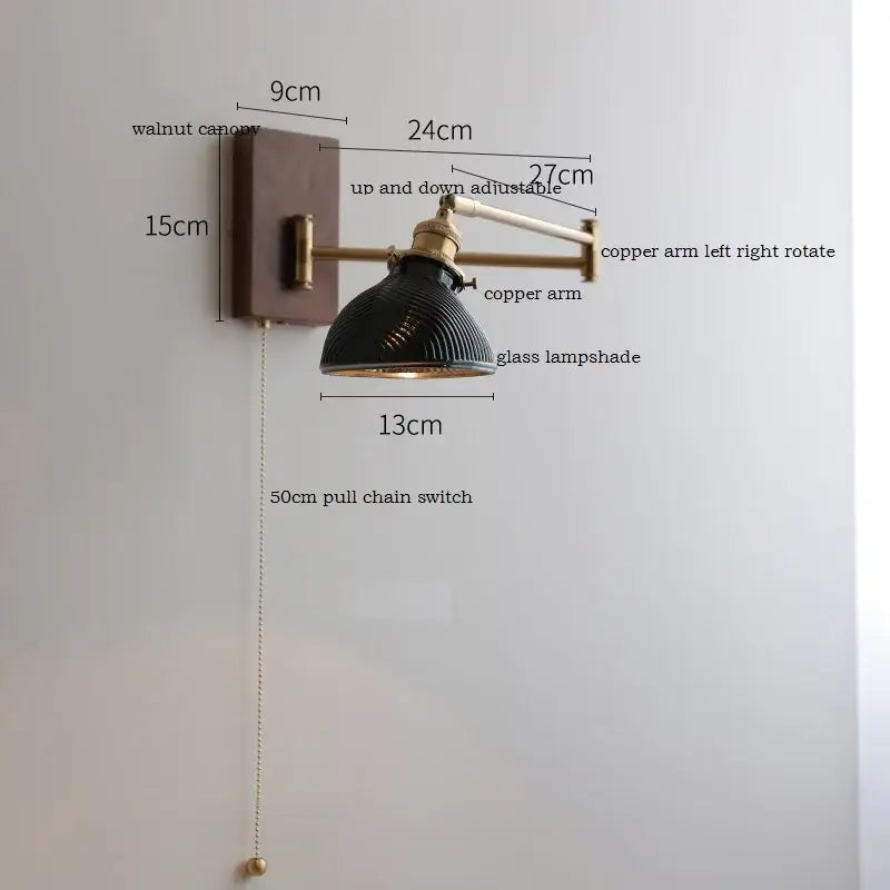 Adjustable brass wall sconce with ribbed glass shade bedroom light