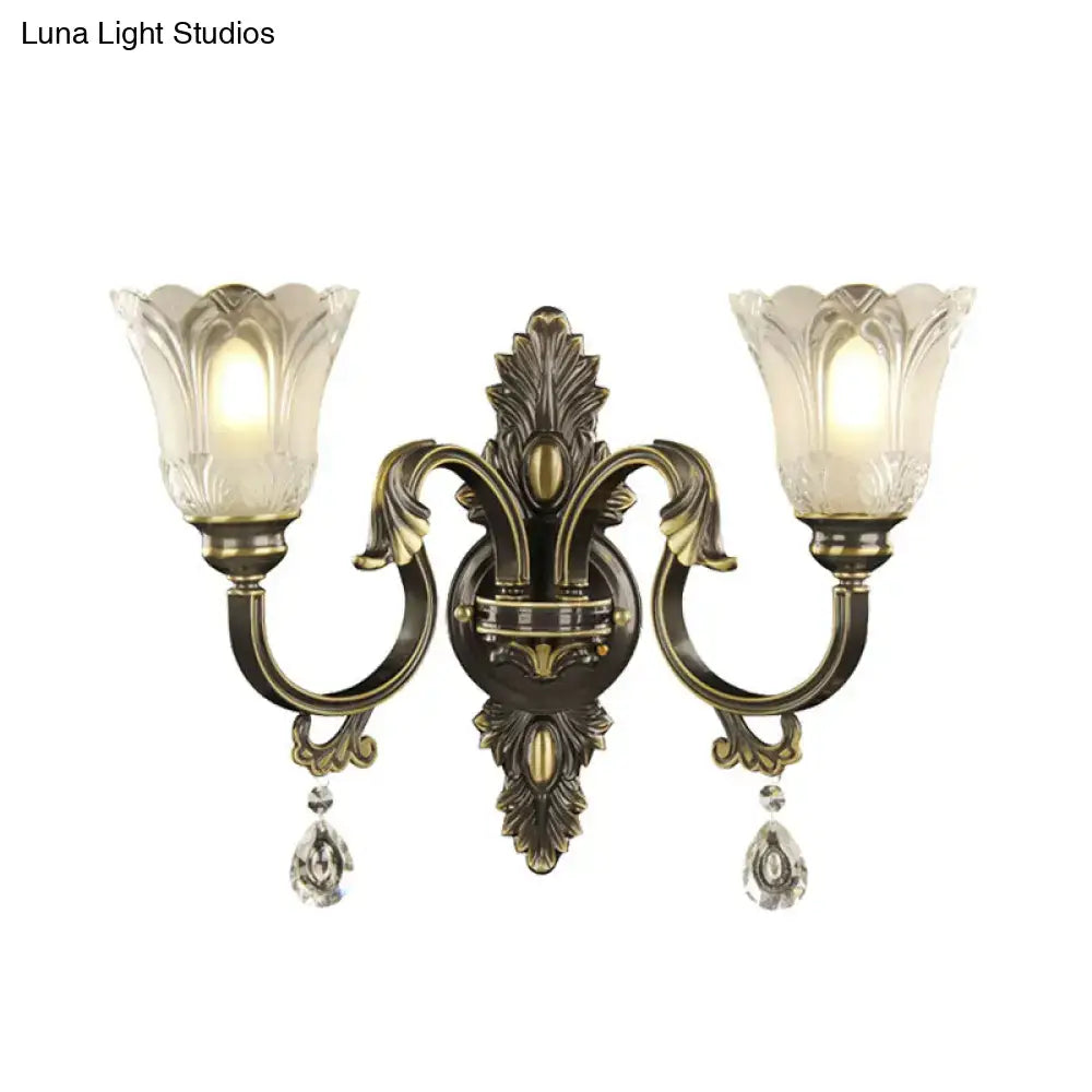 Antique brass floral wall sconce with metal base for bedroom