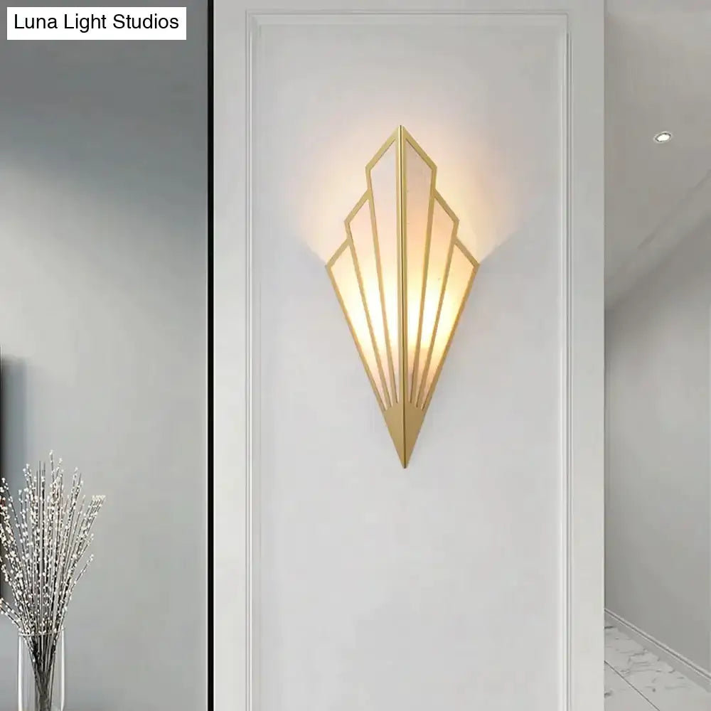 Art deco gold diamond shape modern wall light with geometric fan design and warm ambient lighting for bedroom