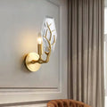 Artistic gold-toned antler wall lamp with faceted crystal shade light fixture for living room illumination