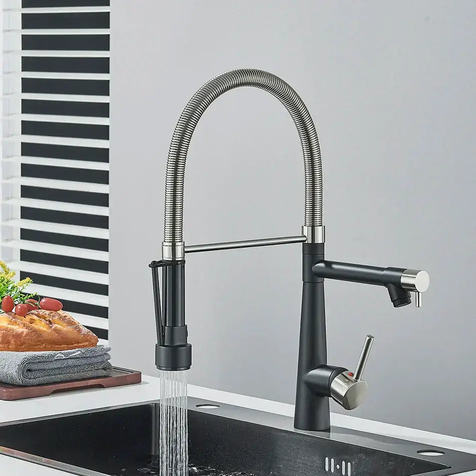 Black and stainless steel kitchen faucet with flexible spout