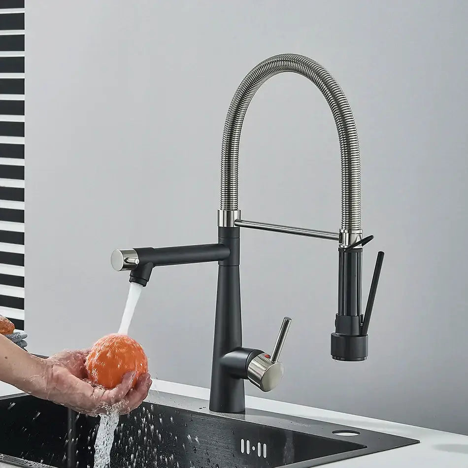 Black and stainless steel kitchen faucet with flexible spout