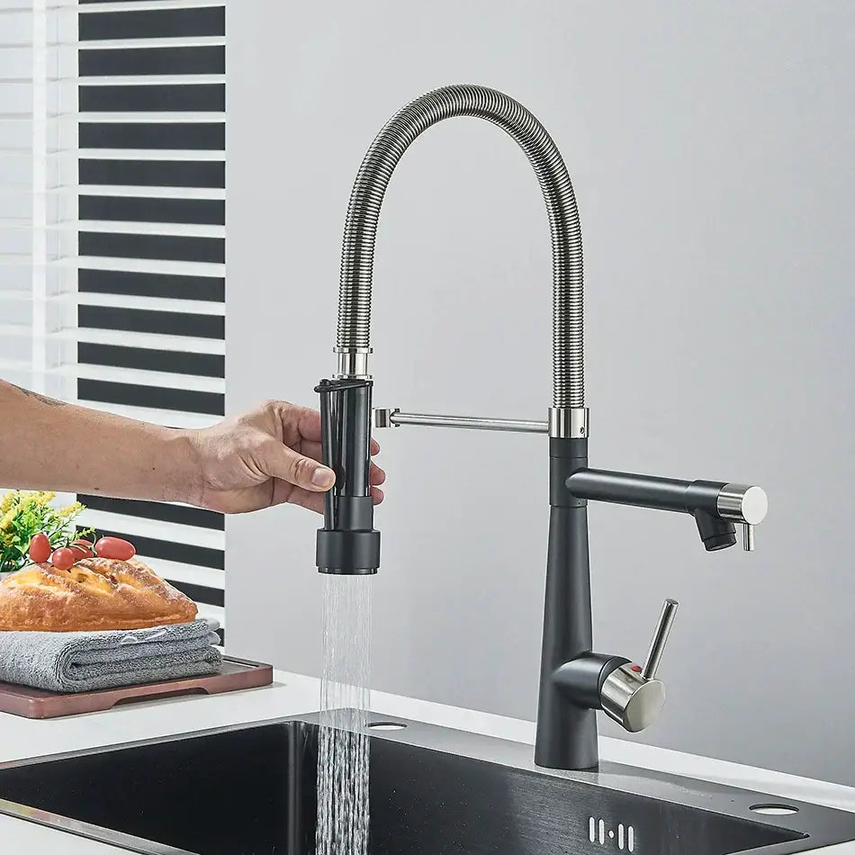 Black and stainless steel kitchen faucet with flexible spout
