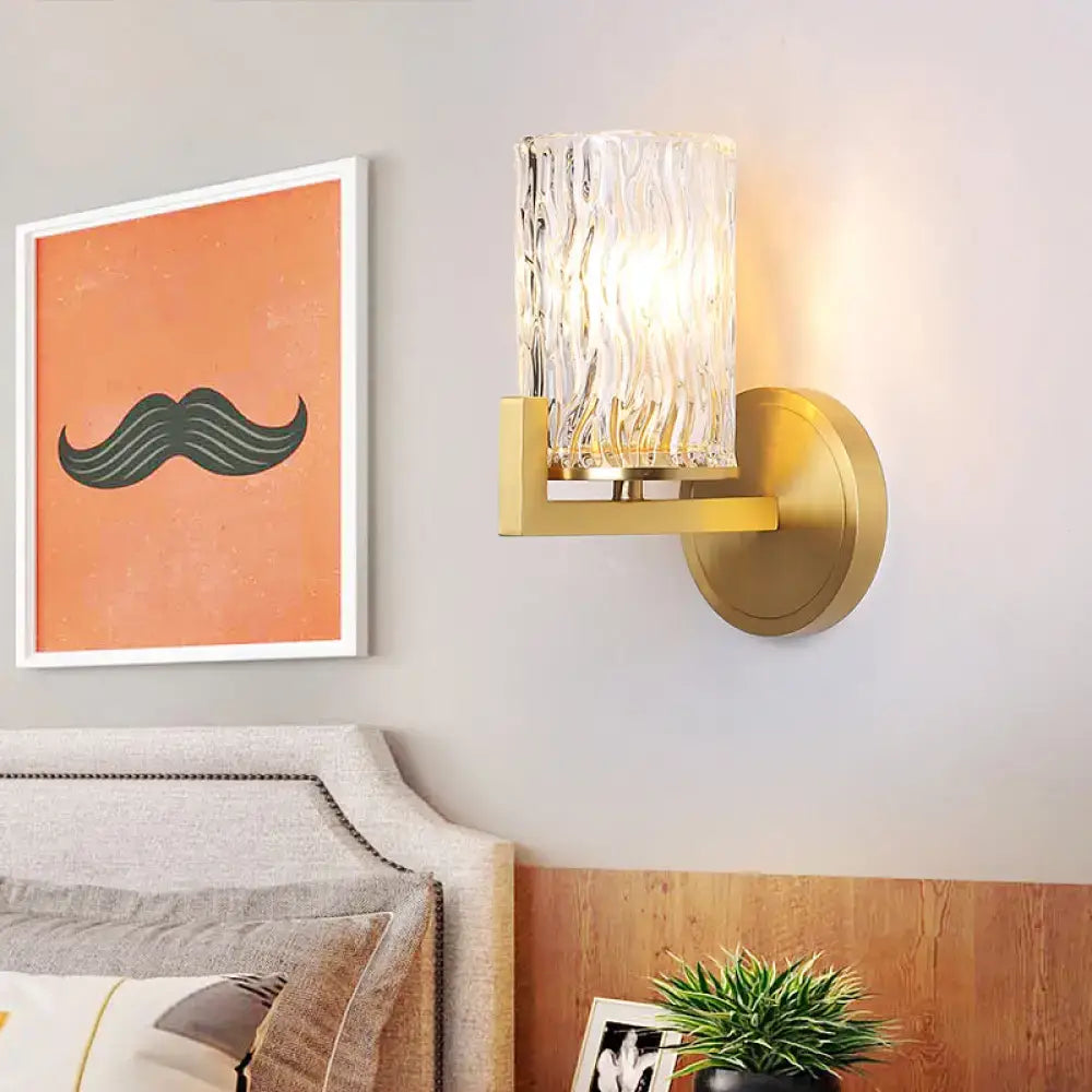 Brass wall light with cylinder rippled glass – bedroom sconce