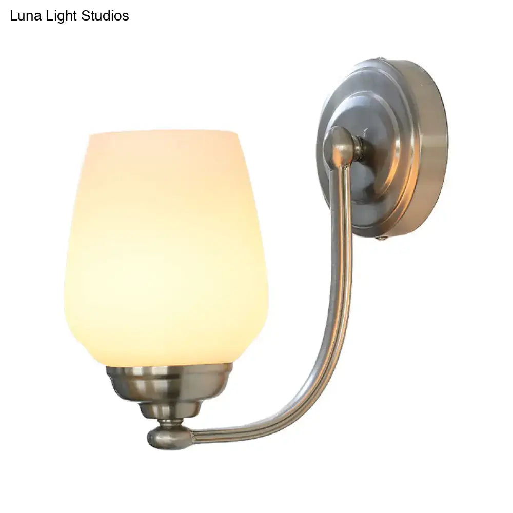Brushed nickel milk glass wall lamp for stairways
