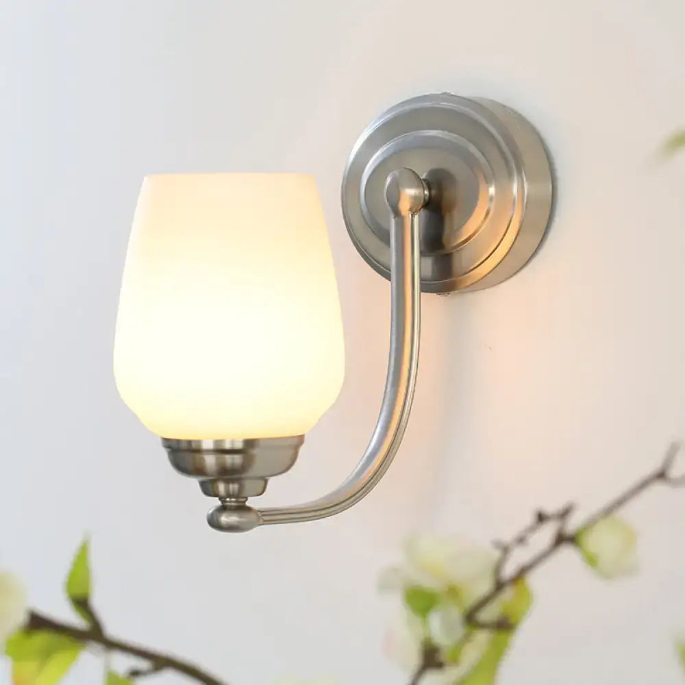 Brushed nickel milk glass wall lamp for stairways