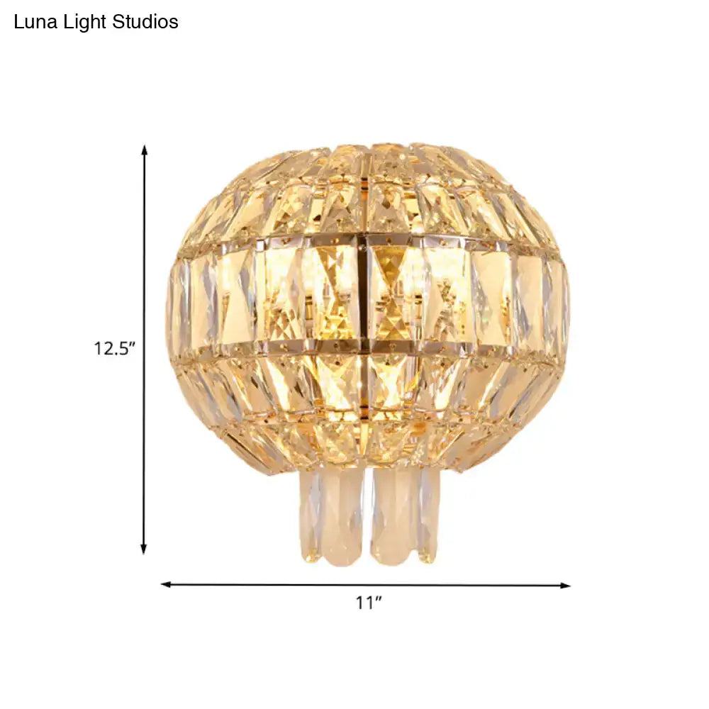 Butterfly tiered gold finish crystal wall sconce with spherical faceted clear glass panels and dangling white crystals