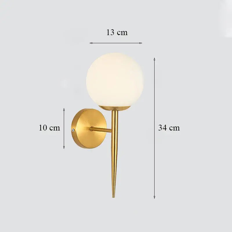 Classic brass glass wall sconce with frosted shade for bedroom