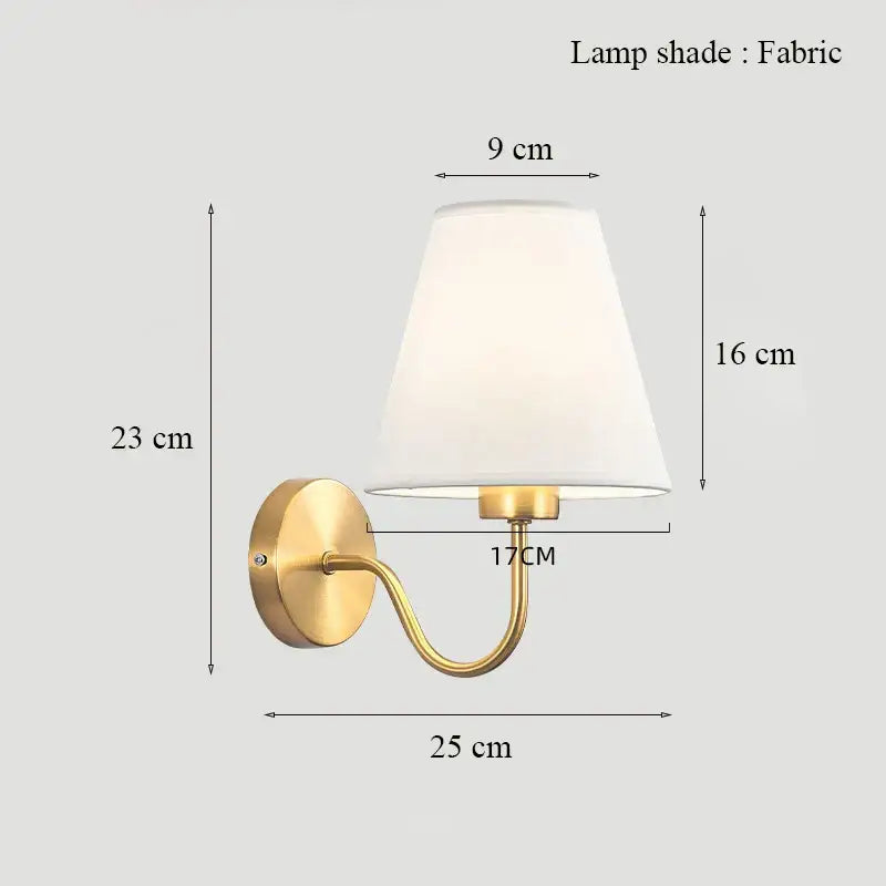 Classic brass glass wall sconce with frosted shade for bedroom