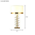 Decorbites brass drum table lamp with gold-toned spiral base and cream fabric shade ideal for nightstands and led lighting
