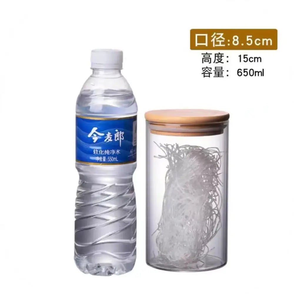 Clear glass storage jars with bamboo lids for kitchen organization
