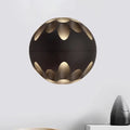 Contemporary black and gold spherical led wall lamp with petal-shaped cutouts for bedroom wall light