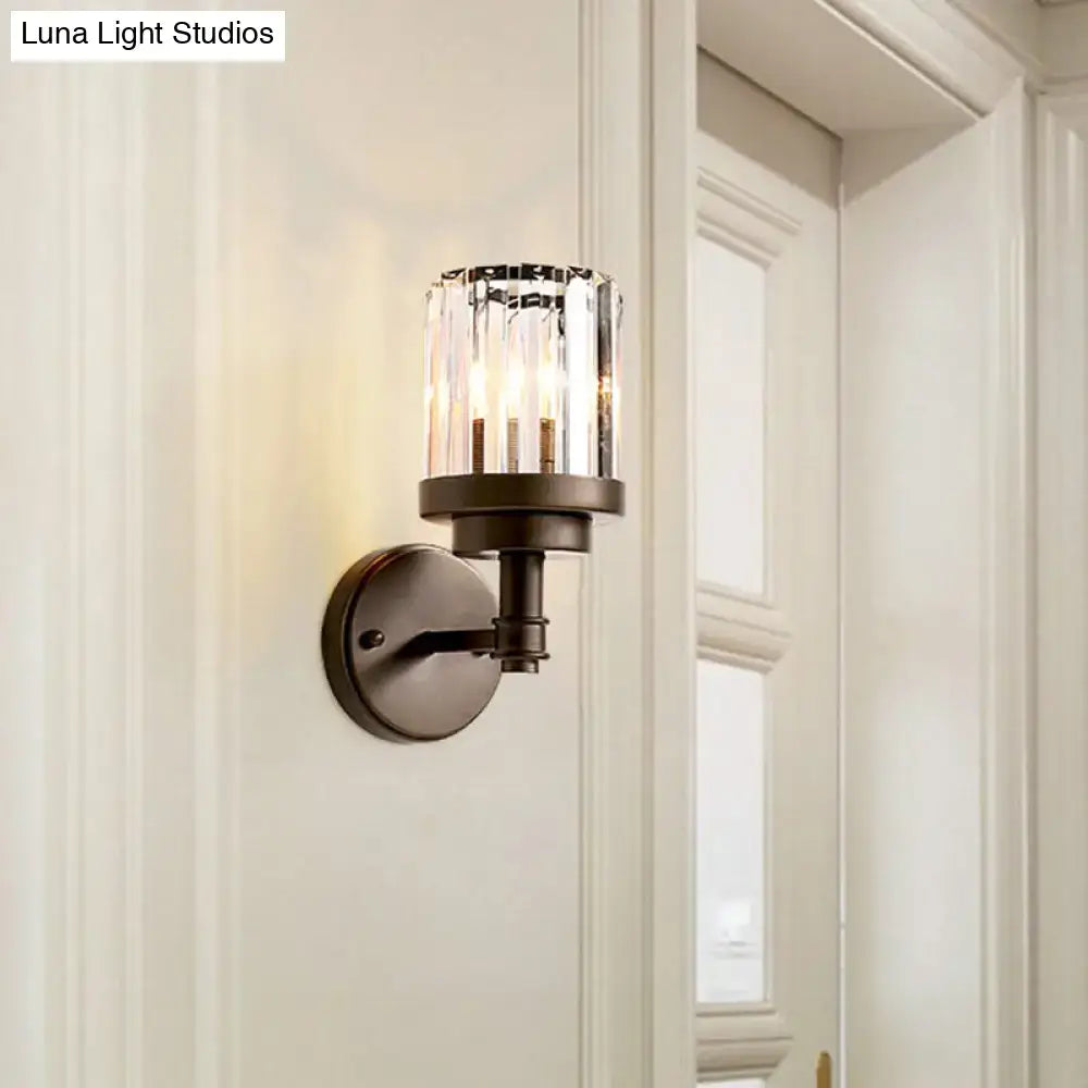 Contemporary bronze wall sconce with ribbed crystal shade hallway light fixture