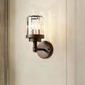 Contemporary bronze wall sconce with ribbed crystal shade hallway light fixture