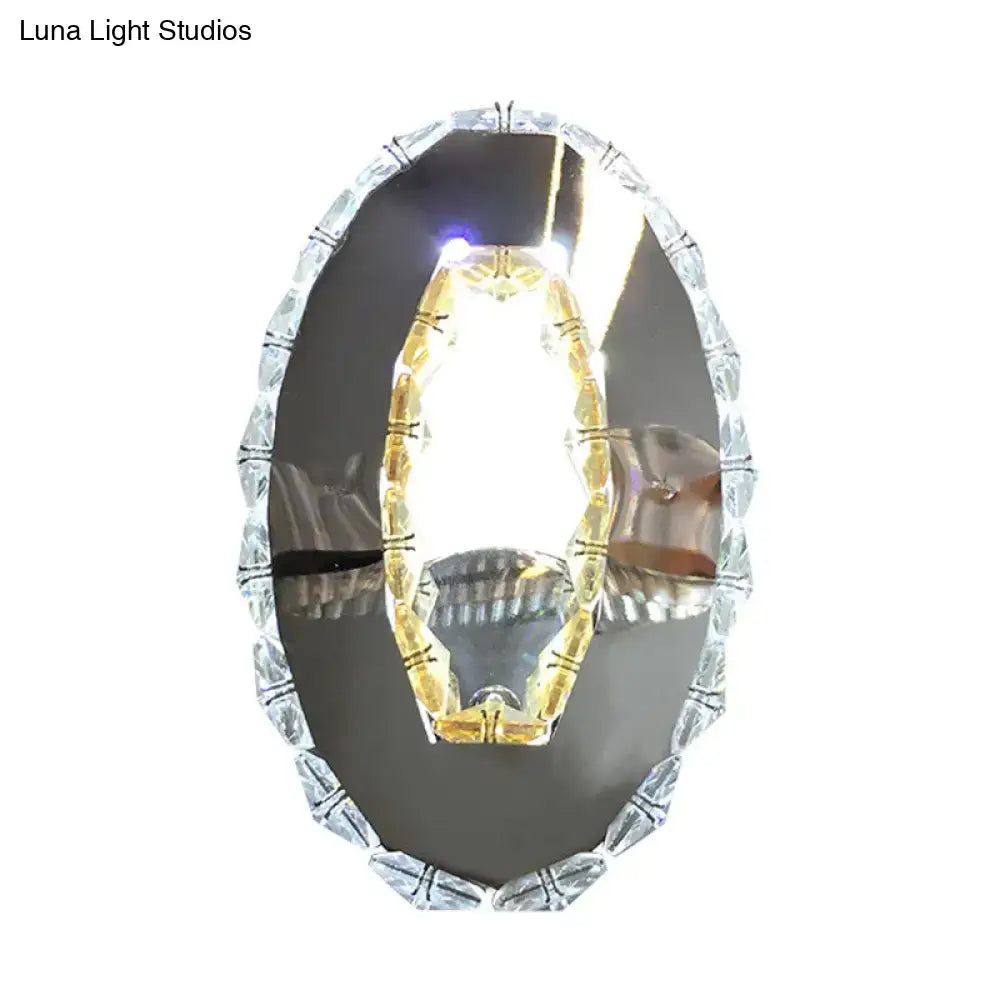 Contemporary chrome crystal oval light fixture warm white bedroom mirror