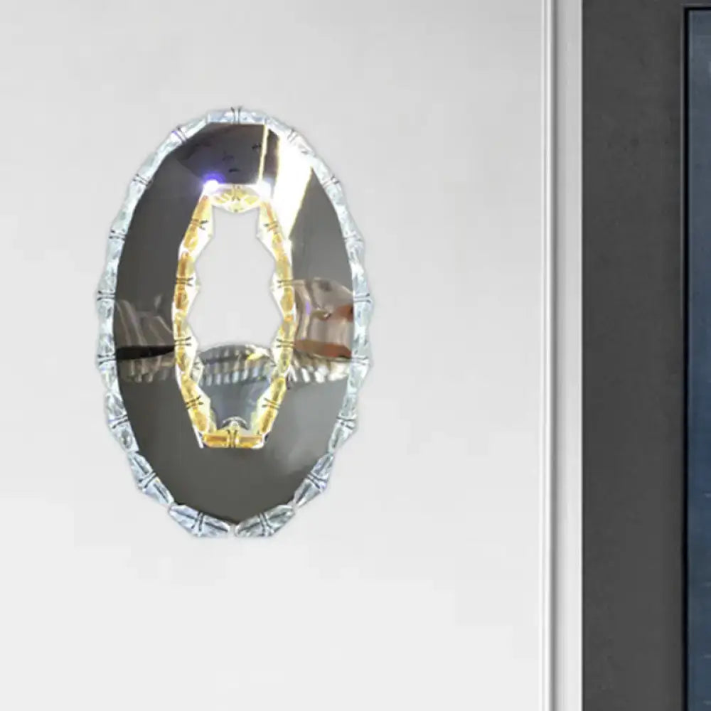 Contemporary chrome crystal oval light fixture warm white bedroom mirror