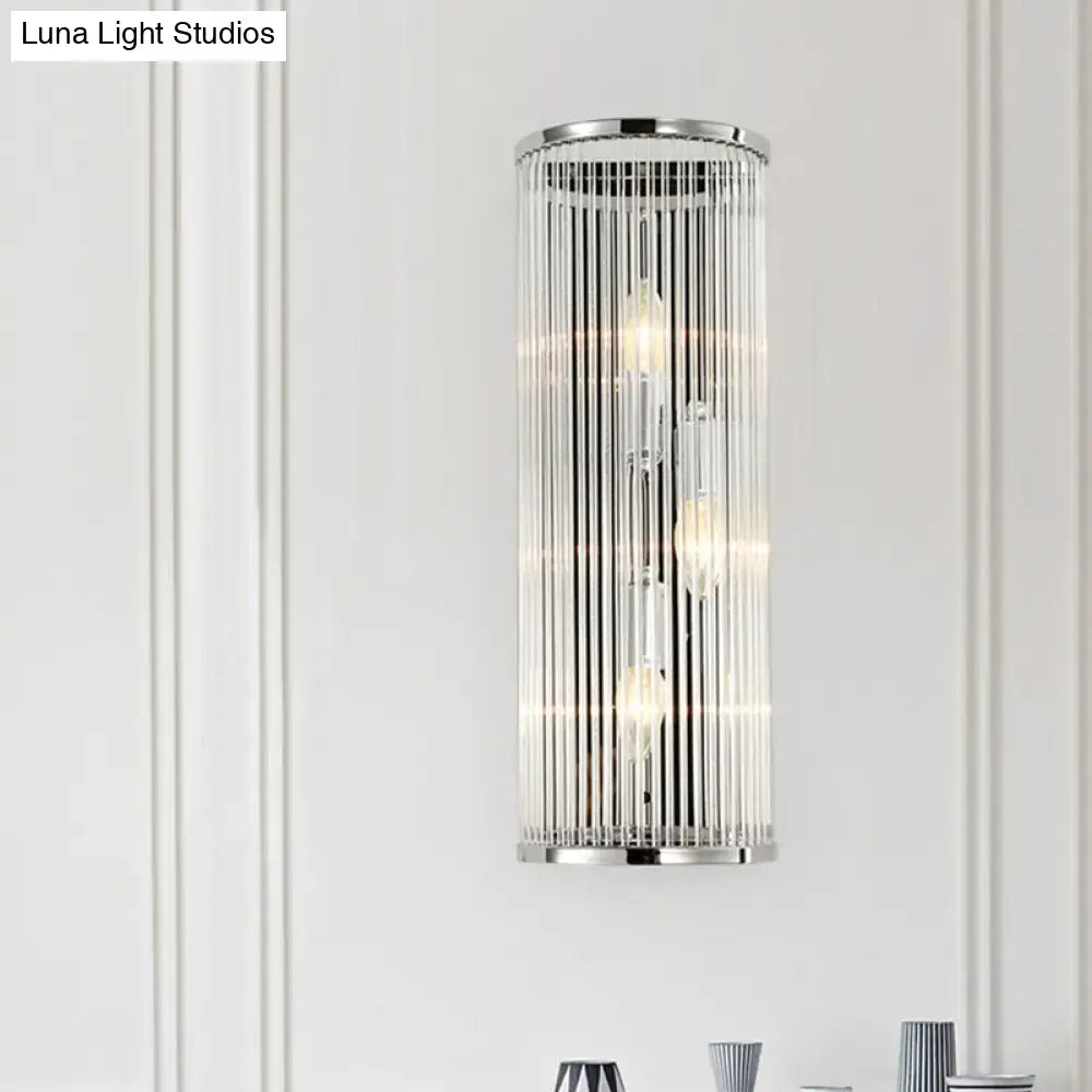 Contemporary chrome wall sconce with clear crystal tube for bedroom
