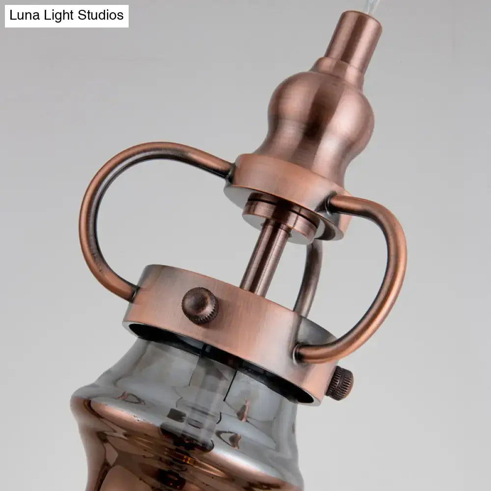 Contemporary copper wall sconce bedroom light with gray amber glass shade