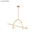 DecorBites™ chandelier lamp with five gold-toned arms and cream glass shade offering warm white lighting