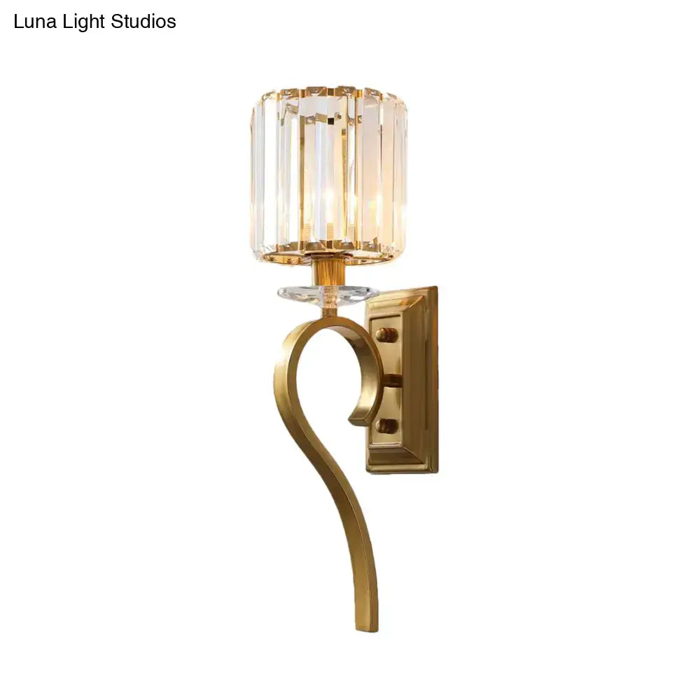 Contemporary gold cylinder wall light with crystal accents for bedroom