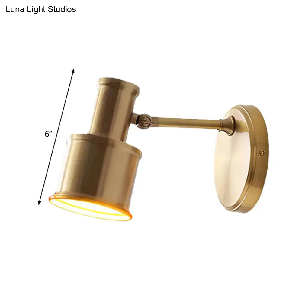 Contemporary gold metal cylinder wall sconce – bedroom spotlight