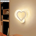 Contemporary white love heart wall mounted light with textured dotted accent panel and soft ambient led lighting
