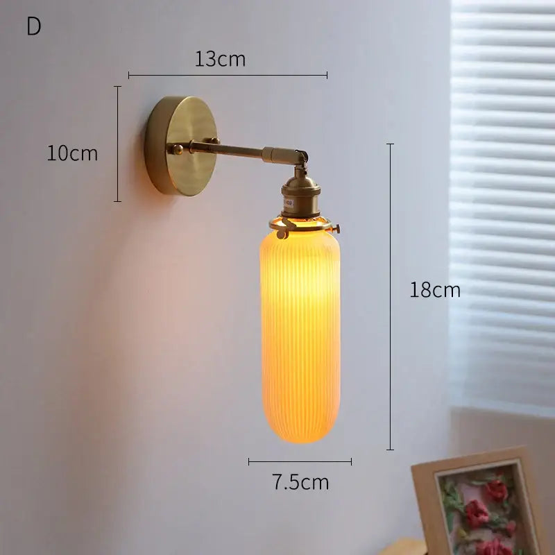 Cream ceramic led wall light with copper arm bedroom sconce