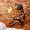 DecorBites™ 1-Light Industrial Robot Table Lamp - Antiqued Bronze Metal Nightstand Light for Bedroom