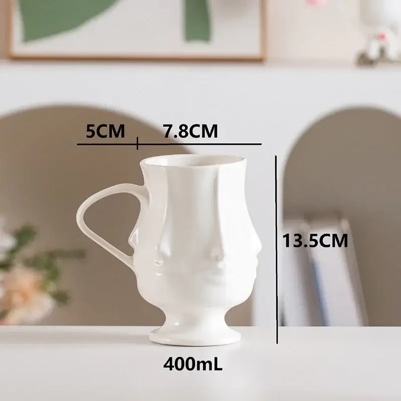DecorBites™ Abstract Face Ceramic Coffee Mug Dining Table Teacup Juice Container